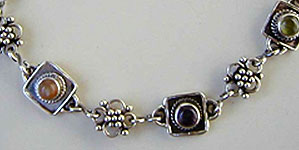 Ankle Bracelet peridot, iolite, amethyst, peach moonstone and handmade sterling silver chains and clasp by Vicky Jousan