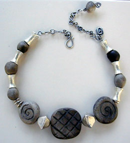 pit fired clay beads and silver necklace by Vicky Jousan