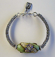 Sterling silver wire wrapped bracelet with Klew bead by Vicky Jousan