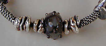 Lampwork Bead by Bernadette Fuentes with Hill Tribe Silver bangle bracelet - by Vicky Jousan