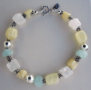 Citrine, Aquamarine, Calcite, Quartz and sterling silver necklace by Vicky Jousan