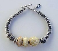 Lampwork Beads and Sterling silver bracelet by Vicky Jousan