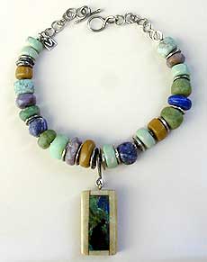 Hand carved stones and sterling silver necklace by Vicky Jousan